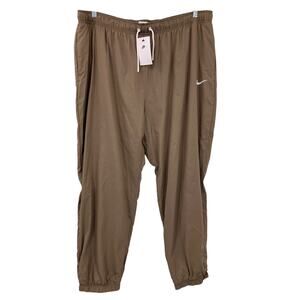 Nike Essential REVOLVE Sanddrift Tan Oversized Fit High Rise Jogger Track Pants